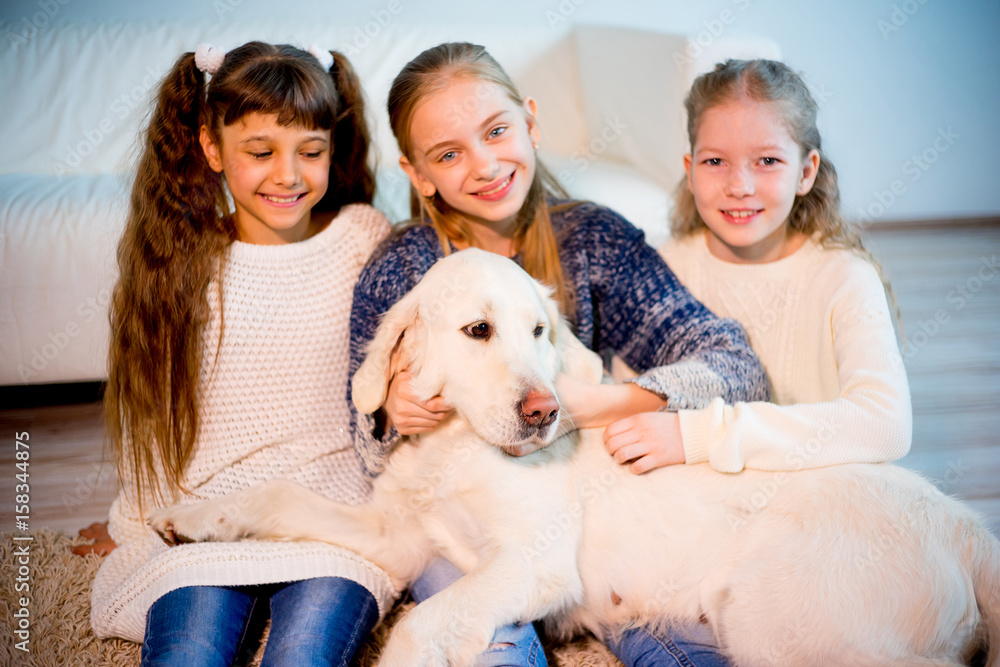 Children playing with a dog Children playing with a dog