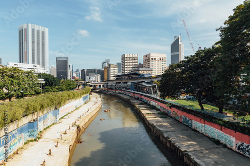 Klang river and cityscape that viewed from sky train station in Kuala Lumpur, Malaysia.