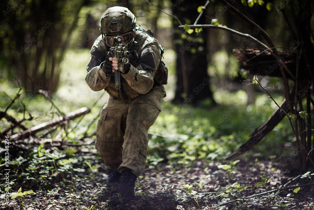 Military man in helmet ,camouflage