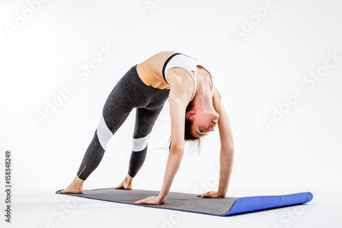 Sporty woman doing stretching exercise