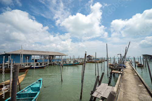 Fisherman boats anchored at Tanjung Piai jetty. Tanjung Piai is a cape in Johor  Malaysia. It is the most southern point of mainland Asia.