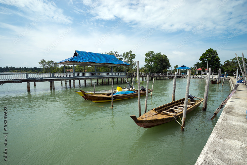 Fisherman boats anchored at Tanjung Piai jetty. Tanjung Piai is a cape in Johor, Malaysia. It is the most southern point of mainland Asia.