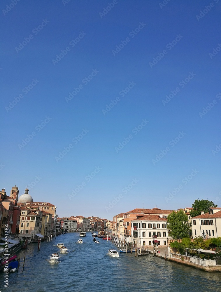 VENICE, ITALY - MAY 18, 2017 : cityscape of Venice city with its boats, gondola and beautiful architecture, in Italy.