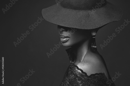 Beautiful girl in black hat