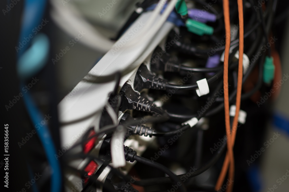 Fototapeta premium cable connector for overloaded power boards close up focus at a plug foreground