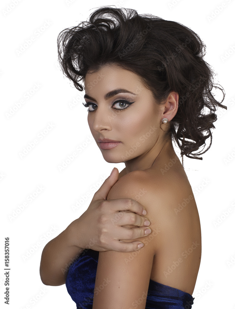 beautiful brunet woman in blue evening dress isolated in white background