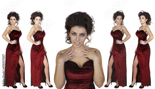 beautiful brunet woman in blue evening dress isolated in white background
