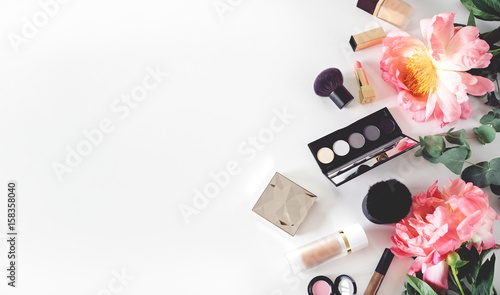 Photography set of decorative cosmetics on white table