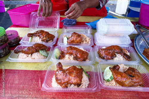 Ayam percik or grilled chicken, popular Malay food in Malaysia photo