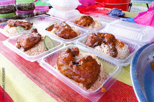 Ayam percik or grilled chicken, popular Malay food in Malaysia photo