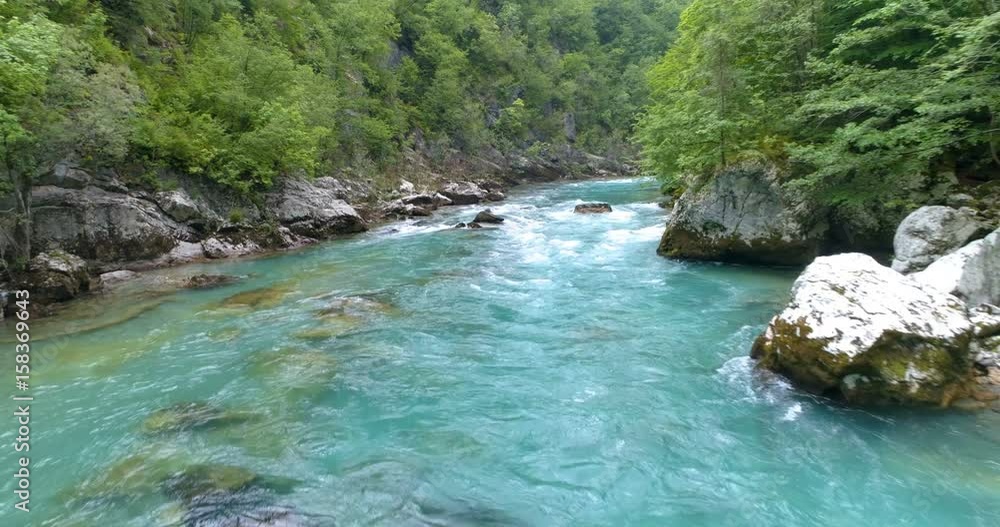 Mountain river with a rapid current surrounded by forests. Tara River, Montenegro.
Aerial.
Mountain river with a rapid current surrounded by forests. Tara River, Montenegro.
Aerial.