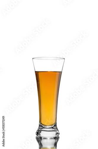 apple or grape clarified juice in glass on isolated background
