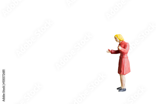 Miniature people isolated on white background