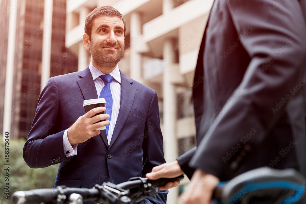 Young businessmen with a bike Young businessmen with a bike