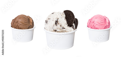 Ice cream scoops in white cups of chocolate, cookies and cream, and strawberry flavours isolated on white background (clipping path included)