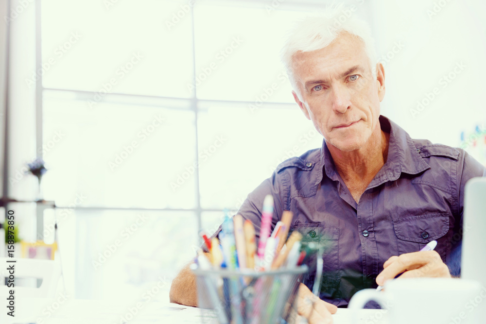 Handsome businessman in office Handsome businessman in office