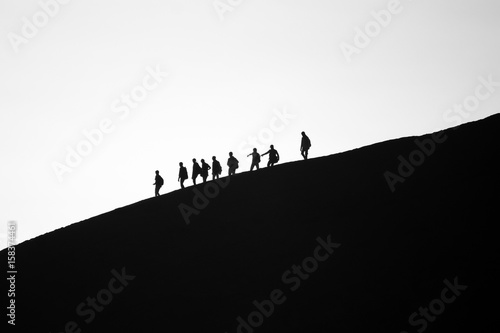 Valokuva A group of friends descending Mt