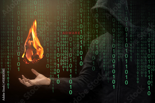 Obraz na plátně Hacker show a fireball on his hand with green digital binary in foreground