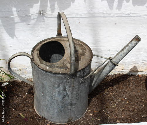 Rustic watering can