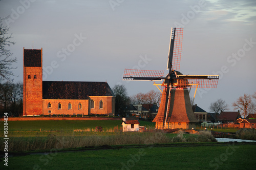 Historic Dutch Church and Wind Mill photo