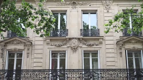 establishing shot of traditional residential building in Paris, close up