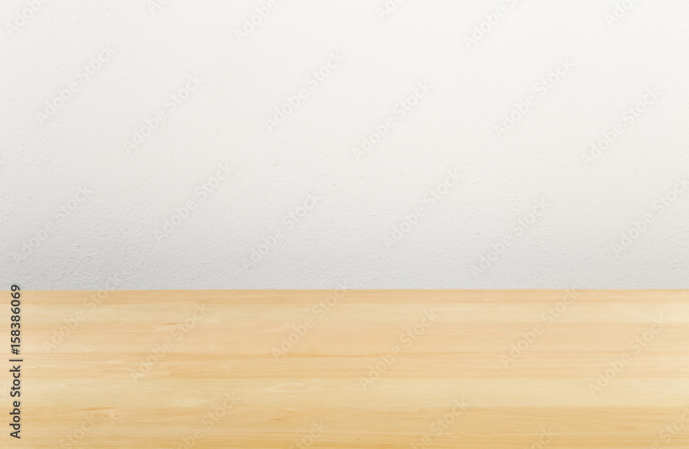 Brown wooden empty office desk with white wall Brown wooden empty office desk with white wall