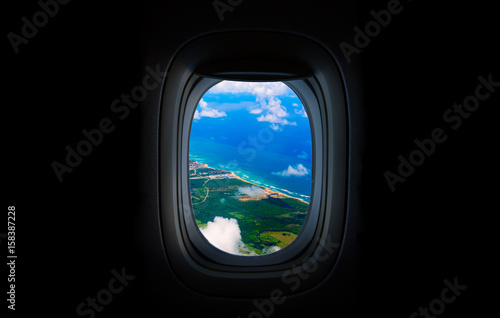 Costline, sea and sky from the plane's window