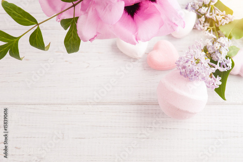 Bath bombs on old wooden background