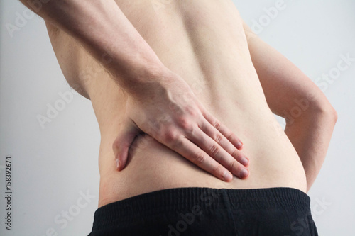 Man suffering from back pain