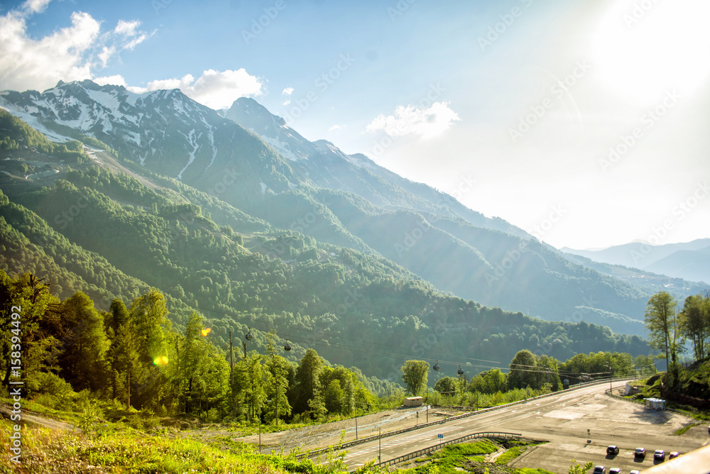 Road among the mountains in the summer. Rosa Khutor, Adler