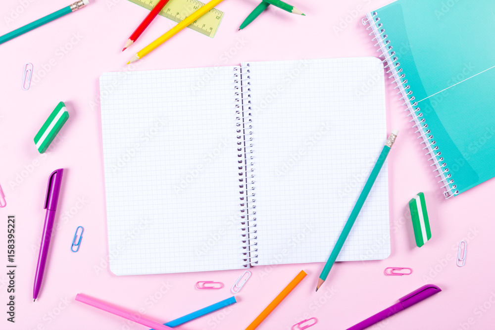School stationery on pink background with copyspace School stationery on pink background with copyspace