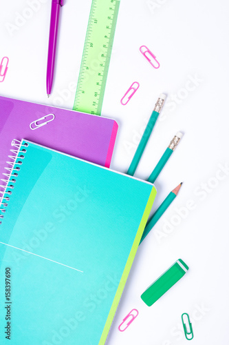 School stationery on white background with copyspace
