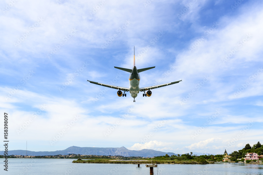 Passenger plane landed at the airport in Kerkyra, Corfu island in Greece. Passenger plane landed at the airport in Kerkyra, Corfu island in Greece.