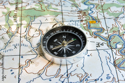 Compass on the map. © sergunt