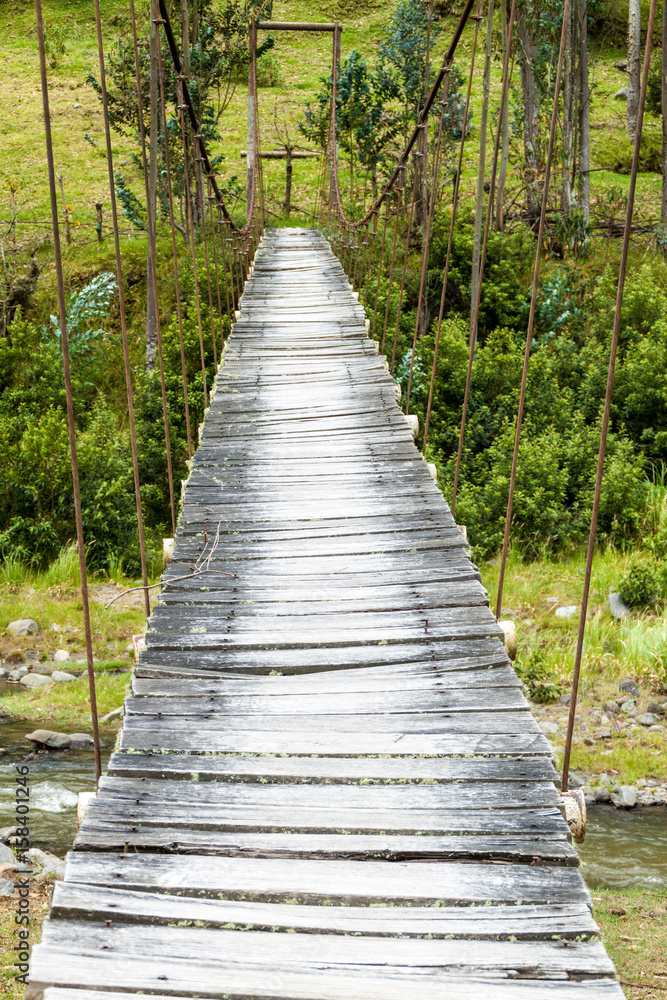 Suspension bridge over Toachi river near Quilotoa crater, Ecuador