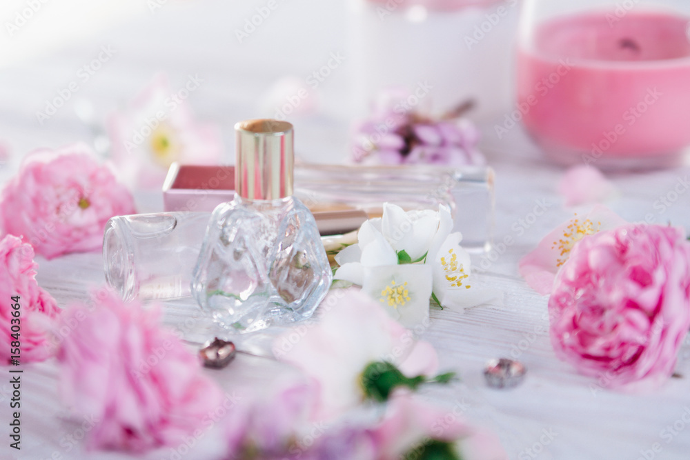 Bottles of perfume with flowers Bottles of perfume with flowers