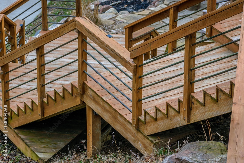 Fototapeta zigzag pattern of wood steps on outdoor deck