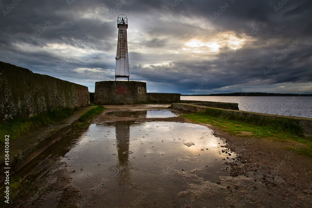 Fototapeta premium A washed beacon for the definition of the fairway. Shipping.
