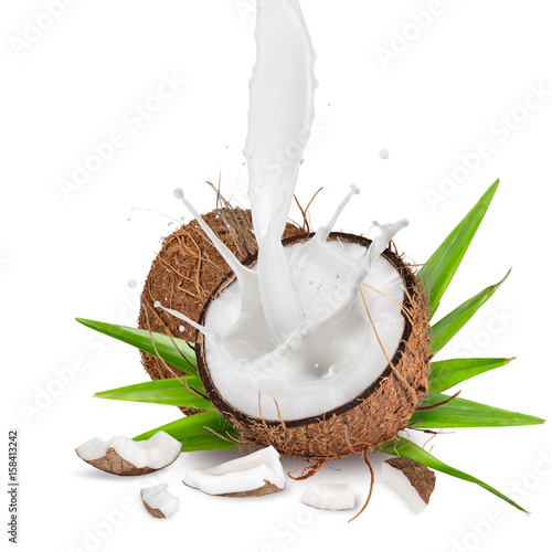 close-up of a coconuts with milk splash on white background