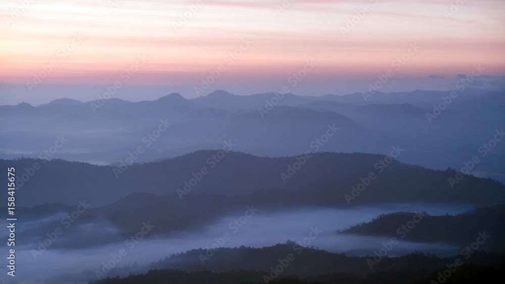Fog in mountains. Fantasy and nature landscape. Nature conceptual image.