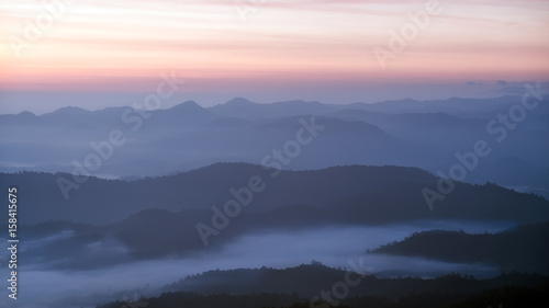 Fog in mountains. Fantasy and nature landscape. Nature conceptual image.