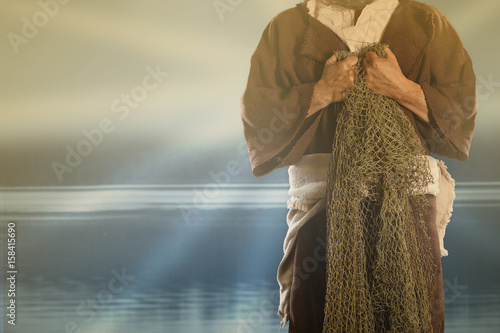 Aplostle Fisherman Holding Nets photo