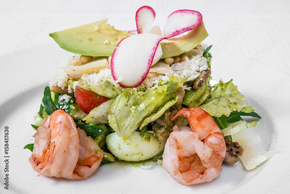 Healthy food. Spring salad from vegetables, herbs and shrimps. Horizontal frame Healthy food. Spring salad from vegetables, herbs and shrimps. Horizontal frame