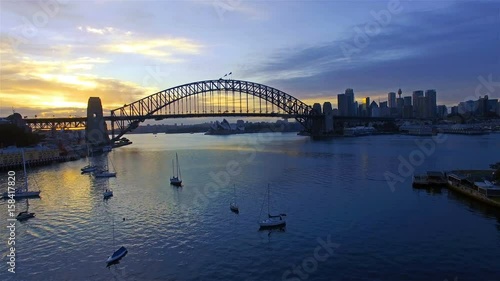 4k aerial footage b-roll of Sydney Harbour Bridge during sunrise. Cinematic look