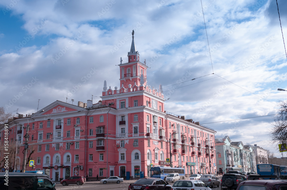 Komsomolsk-on-Amur, a pink building with a spire