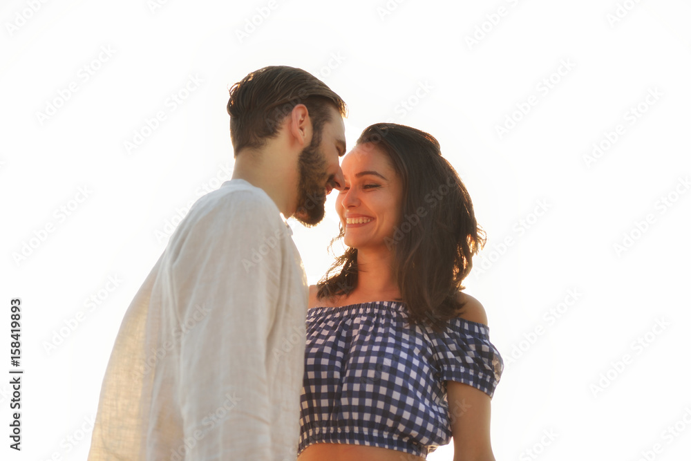 happy couple waling on the beach and having fun happy couple waling on the beach and having fun