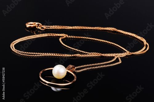 Gold chain on black