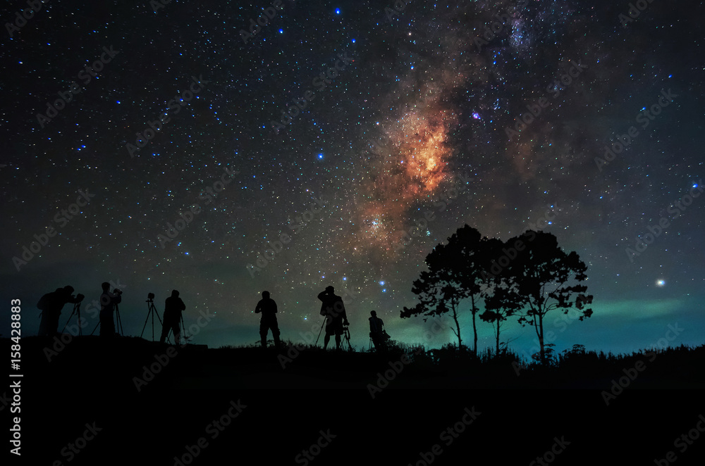 Silhouette man and Milky way