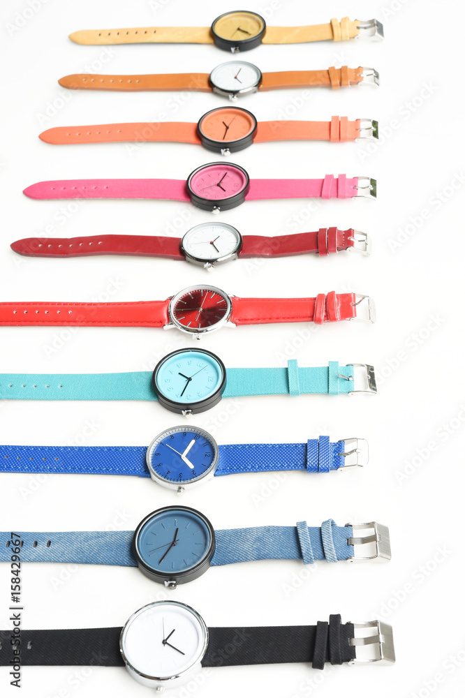 Set of multicolored wristwatches isolated on white background Set of multicolored wristwatches isolated on white background