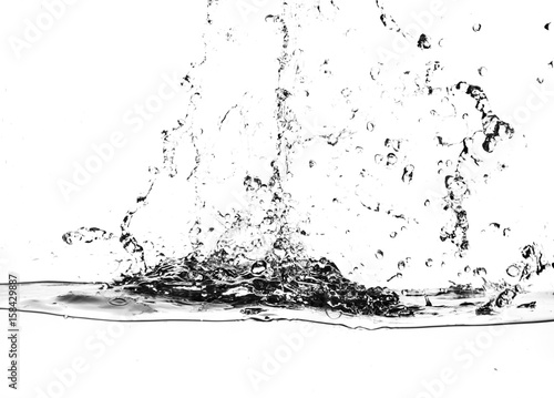 Splashes of water on a white background. Water jet